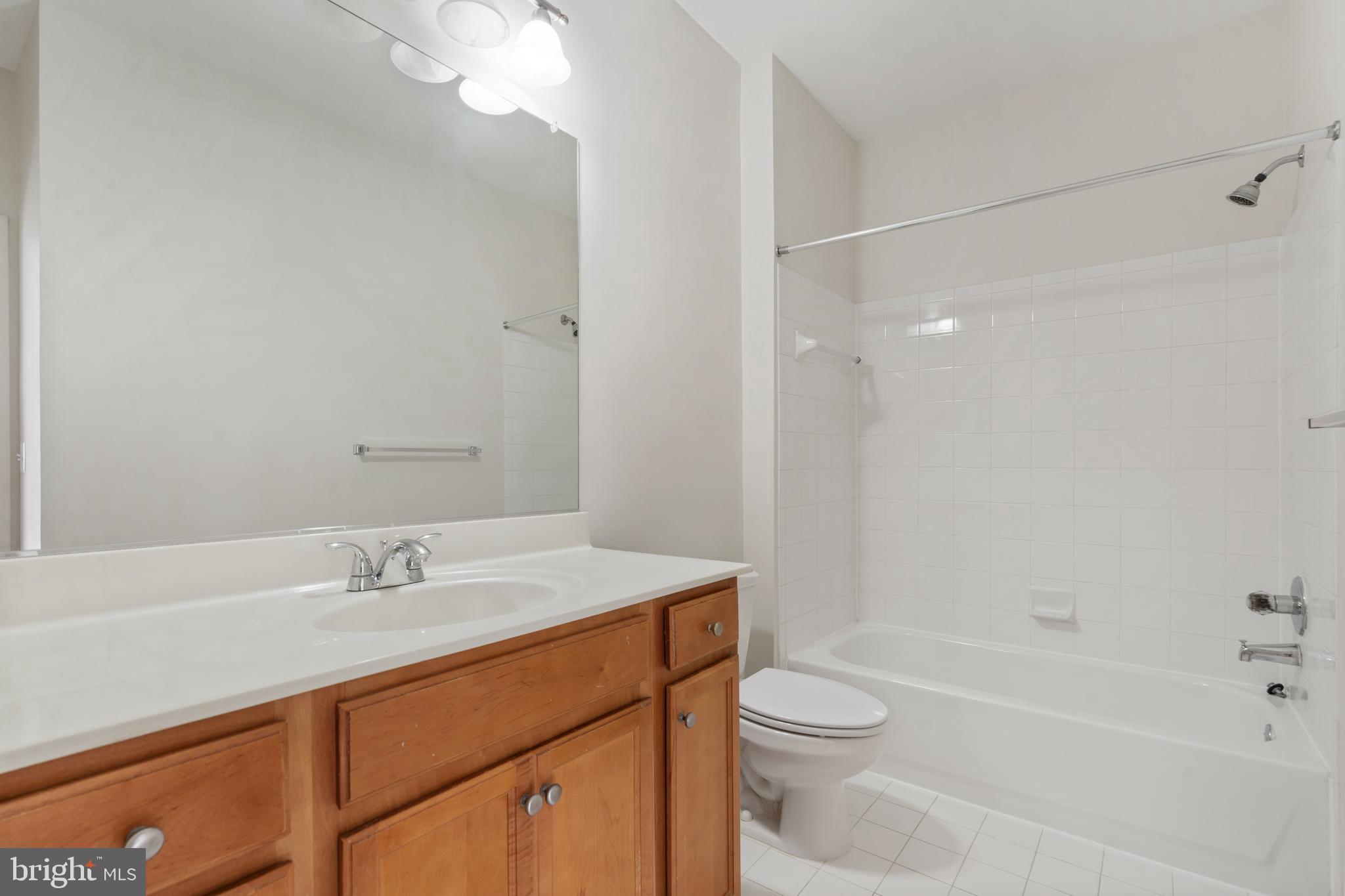 1509 North Point Drive, Unit 103 Reston, VA 20194 - Photo 19 of 33 Primary bathroom