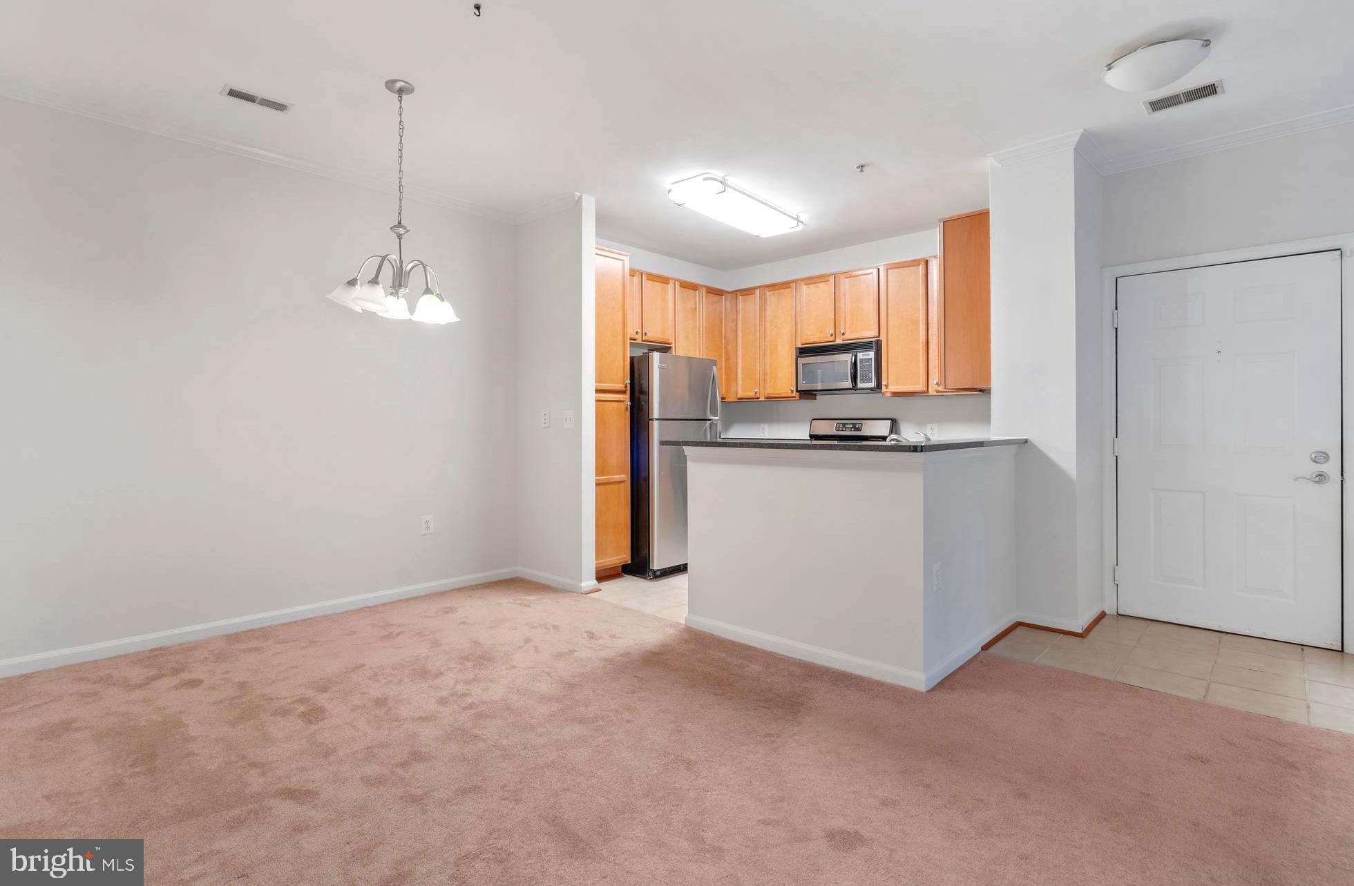 1509 North Point Drive, Unit 103 Reston, VA 20194 - Photo 6 of 33 Dining Room/Kitchen