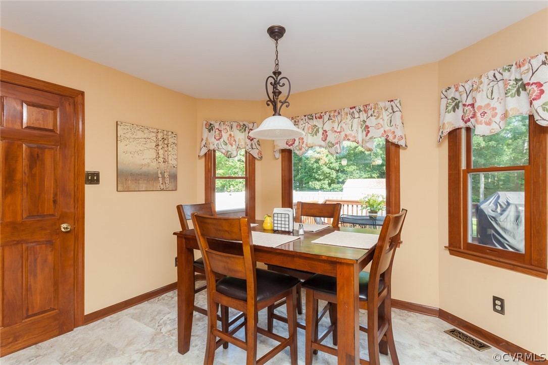 9212 Cattail Road Chesterfield, VA 23838 - Photo 19 of 47 a view of a dining room with furniture window and outside view