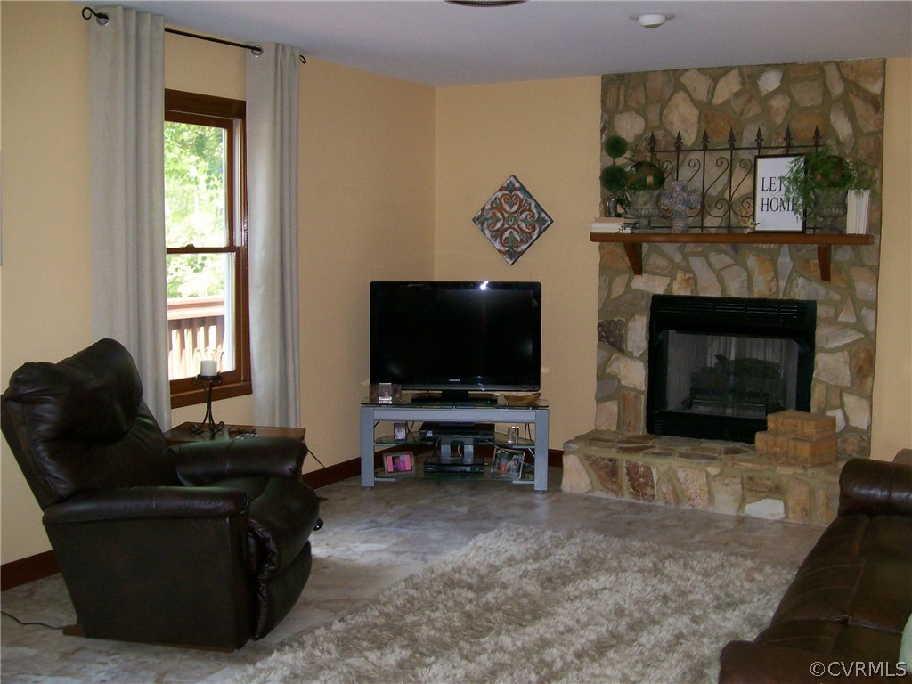 9212 Cattail Road Chesterfield, VA 23838 - Photo 20 of 47 a living room with furniture and a flat screen tv