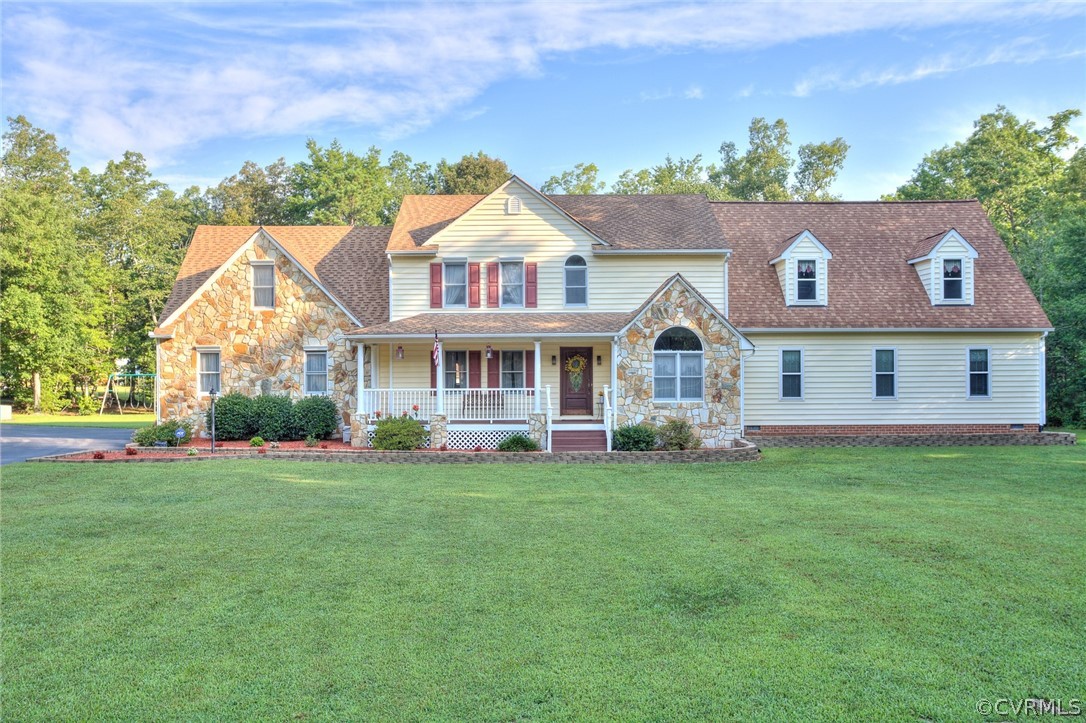 9212 Cattail Road Chesterfield, VA 23838 - Photo 2 of 47 a front view of a house with a garden