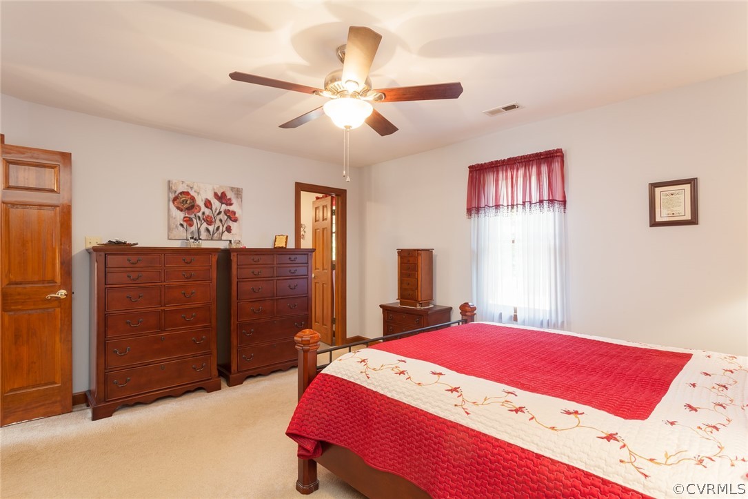 9212 Cattail Road Chesterfield, VA 23838 - Photo 23 of 47 a bedroom with a bed and a dresser