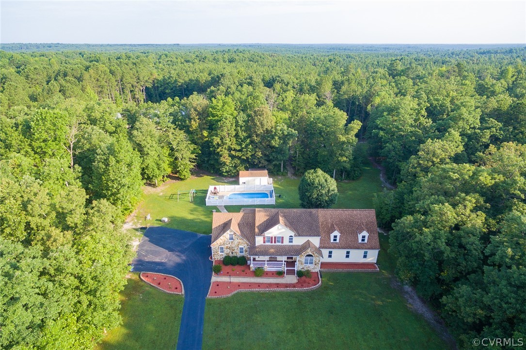 9212 Cattail Road Chesterfield, VA 23838 - Photo 3 of 47 an aerial view of a house with garden space and trees in the back