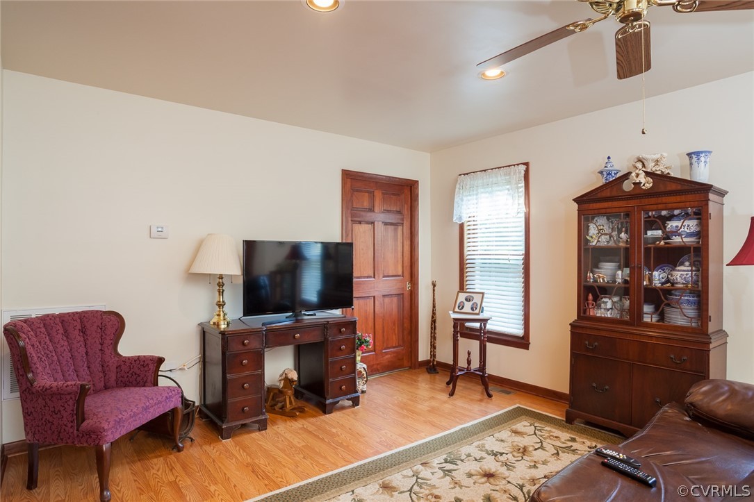 9212 Cattail Road Chesterfield, VA 23838 - Photo 35 of 47 a living room with furniture and a flat screen tv