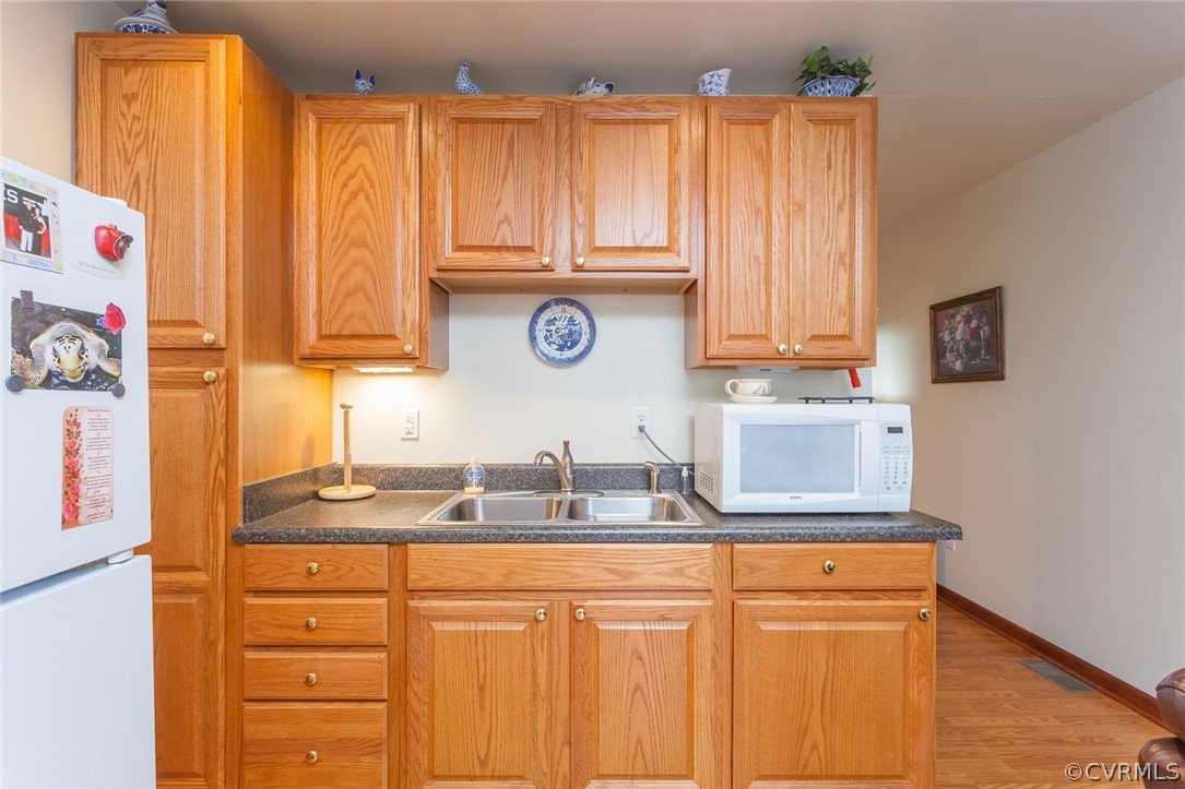 9212 Cattail Road Chesterfield, VA 23838 - Photo 38 of 47 a kitchen with granite countertop cabinets and window