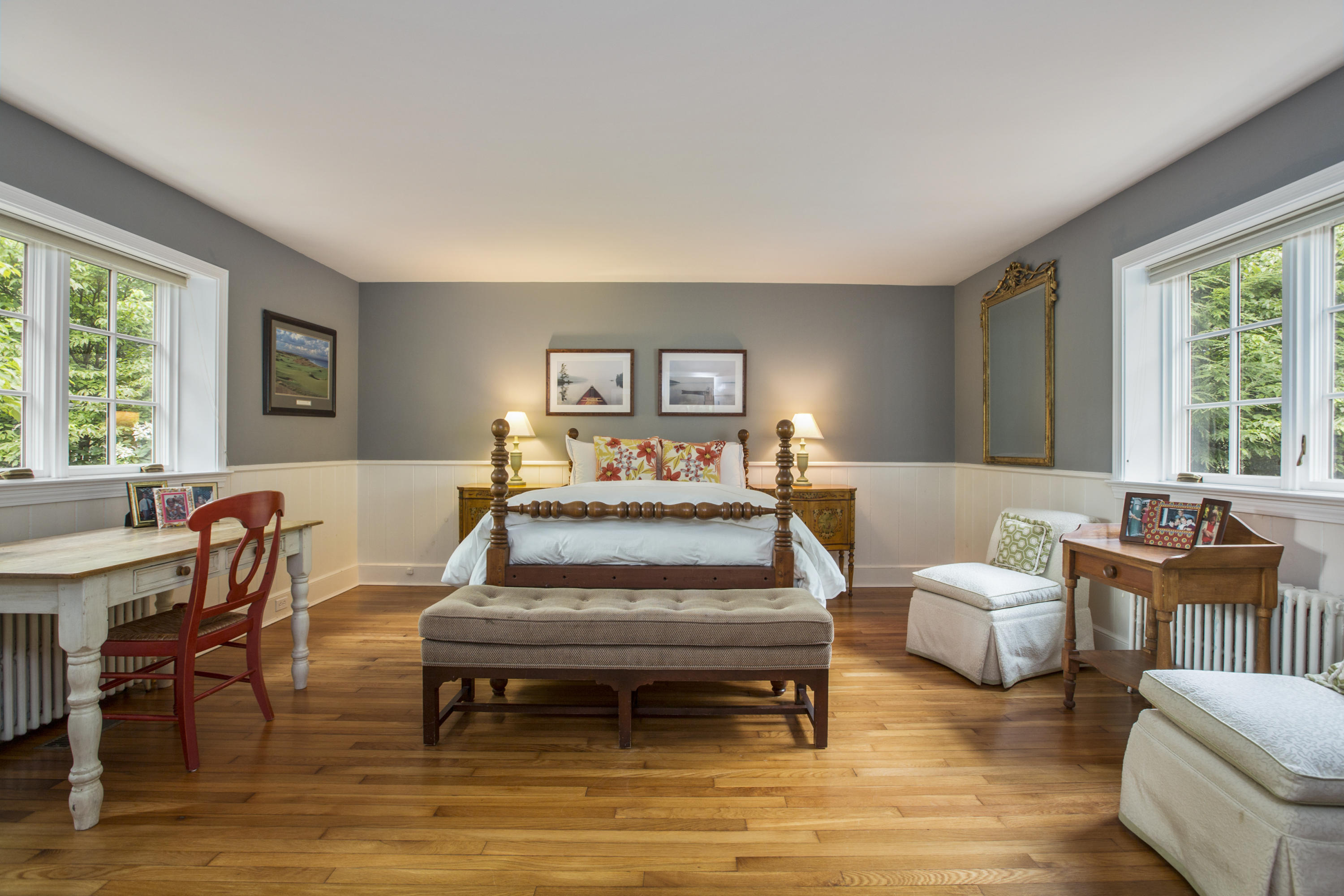 34 Range Road Rowayton, CT 06853 - Photo 19 of 41 a bedroom with furniture and a large window