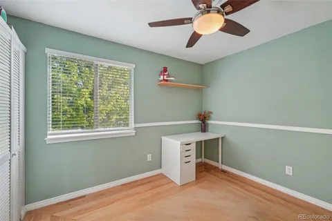 a workspace with furniture and a window