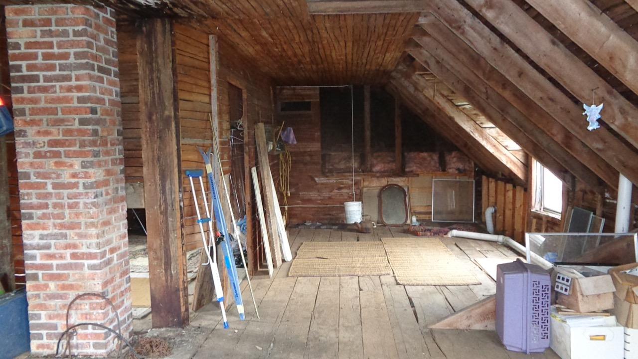 941 Jackson Road Monroe, ME 04951 - Photo 46 of 59 Attic from east looking toward stairs.