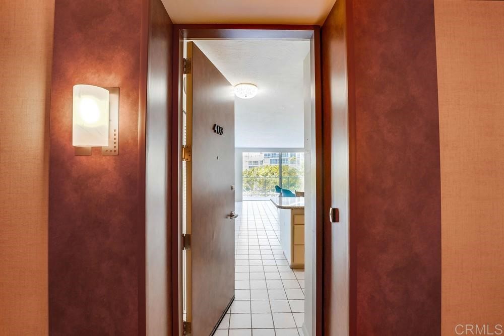 a view of a bathroom from a hallway