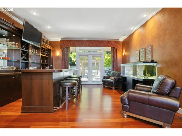 a kitchen with stainless steel appliances granite countertop a stove and a sink