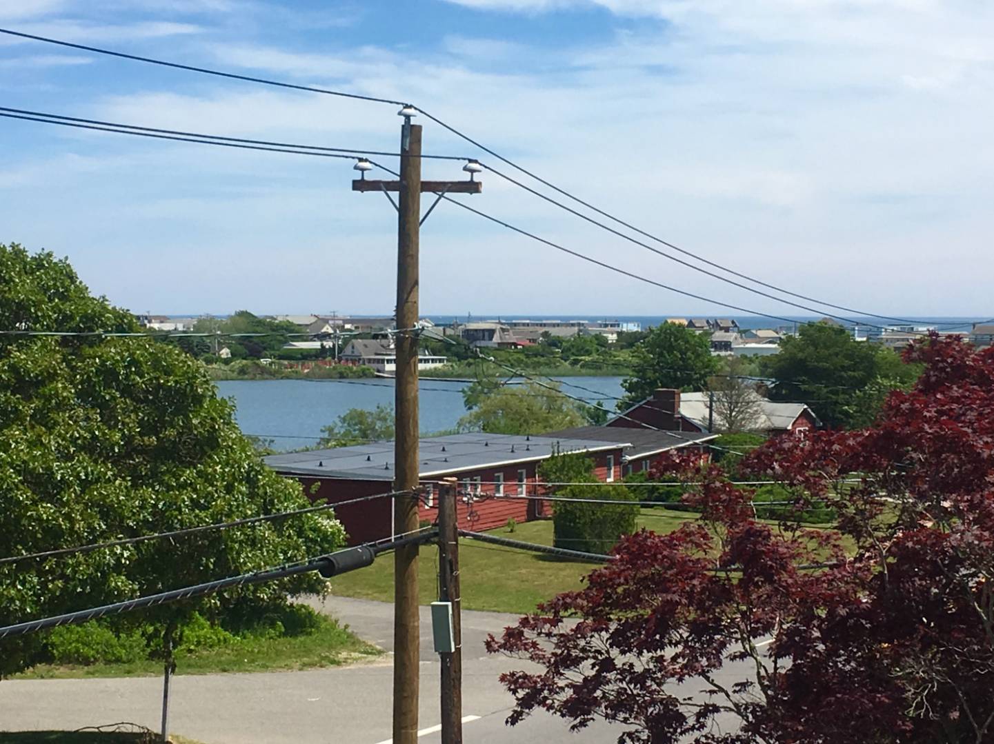 67 2nd House Road Montauk, NY 11954 - Photo 2 of 7 a view of a garden with a lake view