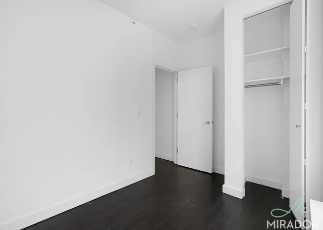 a view of small space with wooden floor