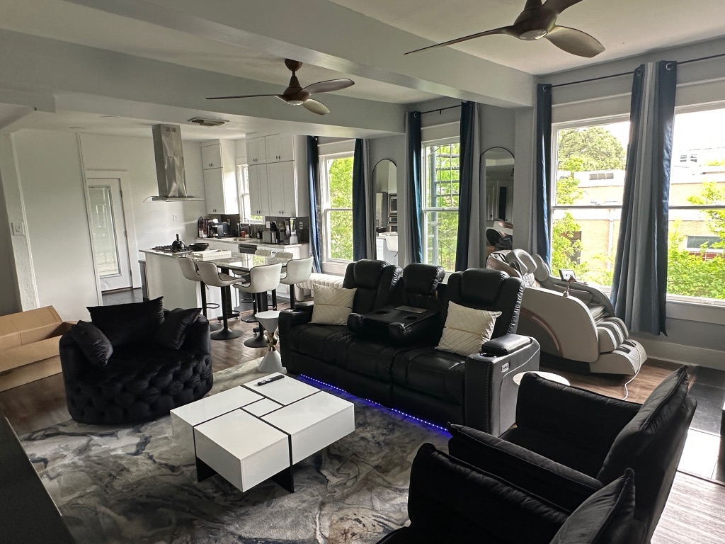3210 Hampton Road, Unit A B C Austin, TX 78705 - Photo 22 of 39 a living room with furniture and a large window
