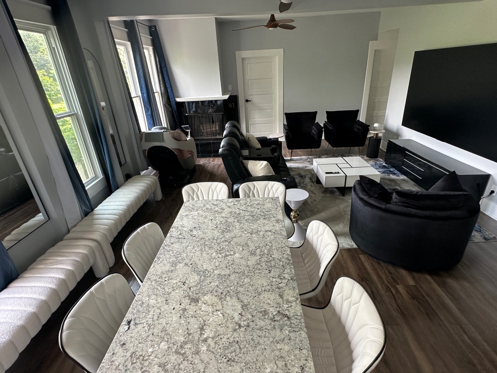 3210 Hampton Road, Unit A B C Austin, TX 78705 - Photo 29 of 39 a living room with furniture and a flat screen tv