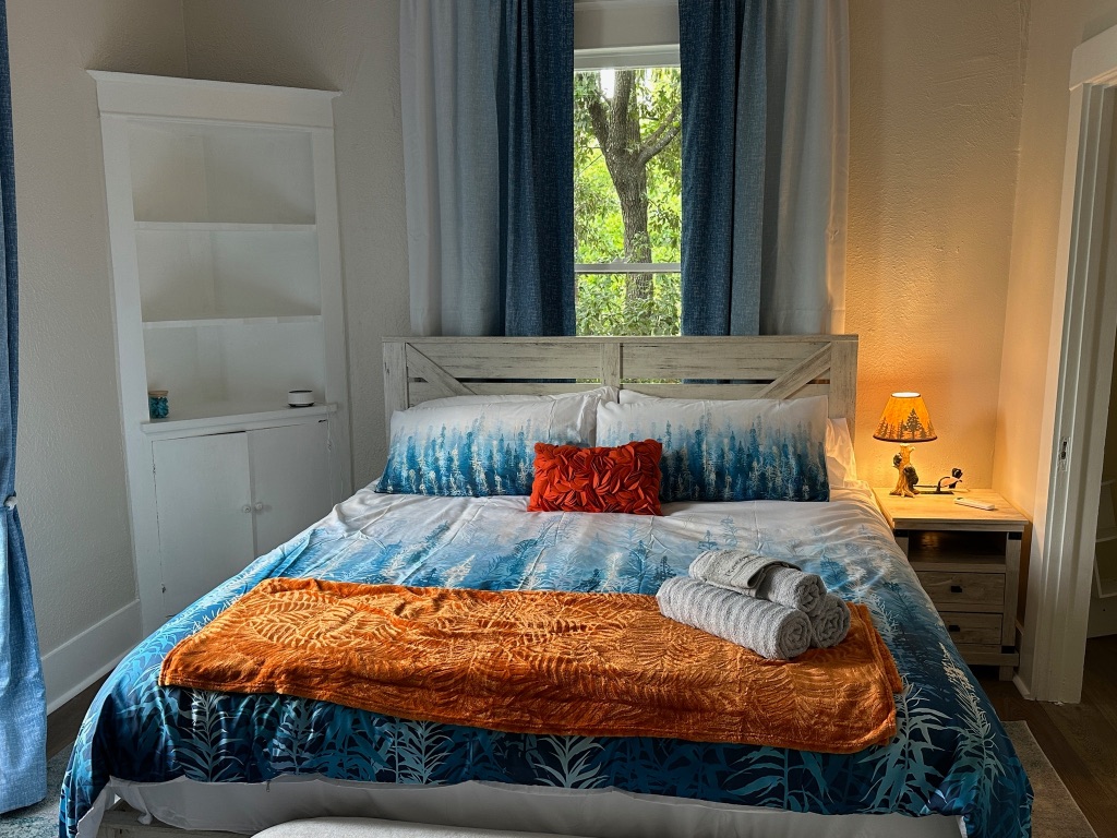 3210 Hampton Road, Unit A B C Austin, TX 78705 - Photo 34 of 39 a bedroom with a bed and a window