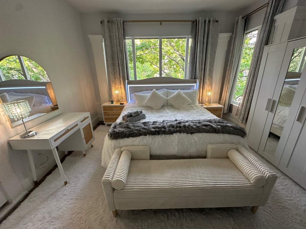3210 Hampton Road, Unit A B C Austin, TX 78705 - Photo 35 of 39 a living room with furniture and a window