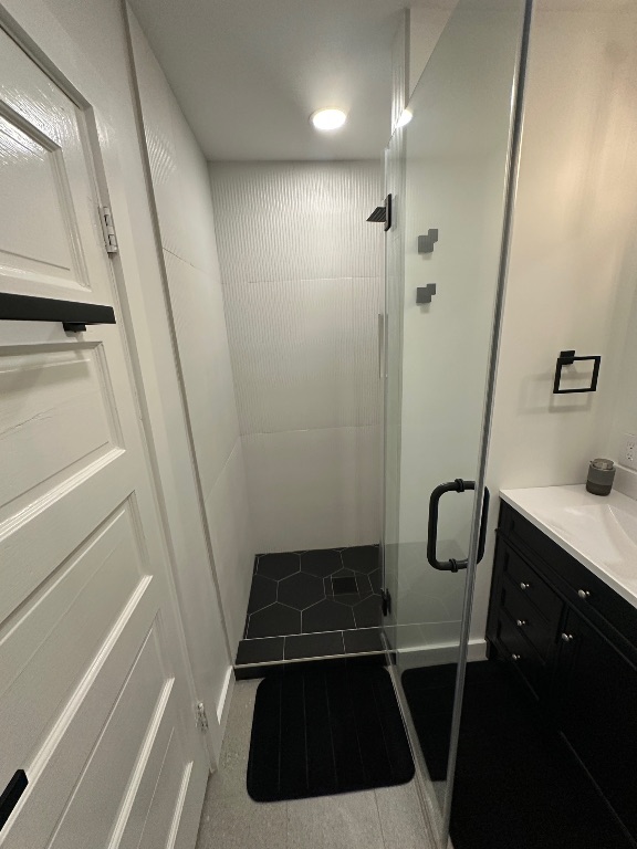 3210 Hampton Road, Unit A B C Austin, TX 78705 - Photo 7 of 39 a bathroom with a sink a toilet a shower and vanity