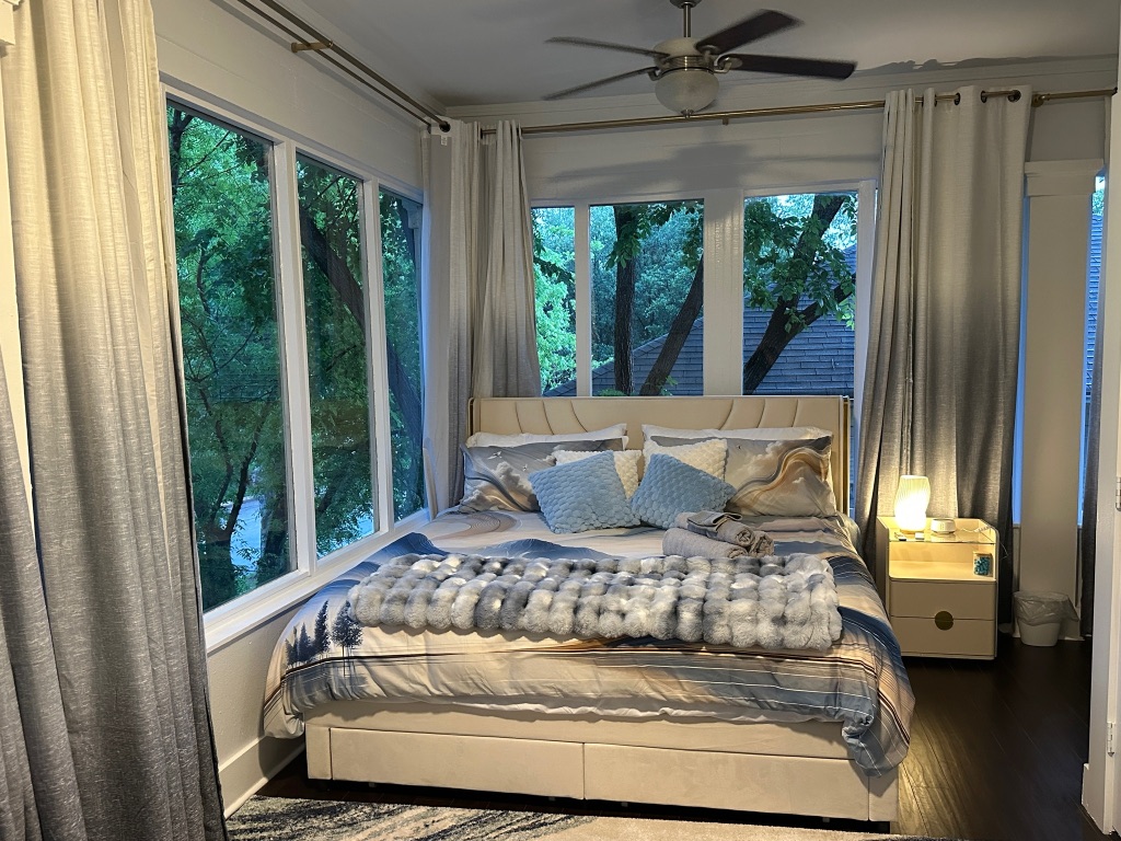 3210 Hampton Road, Unit A B C Austin, TX 78705 - Photo 8 of 39 a living room with furniture and a large window
