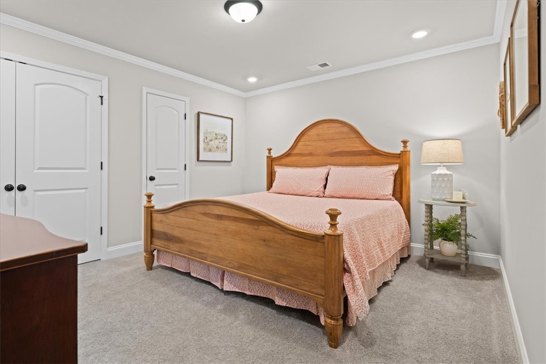 119 Shipyard Circle Anderson, SC 29621 - Photo 36 of 50 A comforting second bedroom on the second floor that accomodates a King Bed and supplemental furniture. Beauty and well designed spaces.