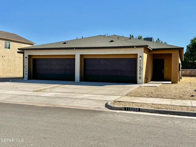 a view of outdoor space and front view of a house