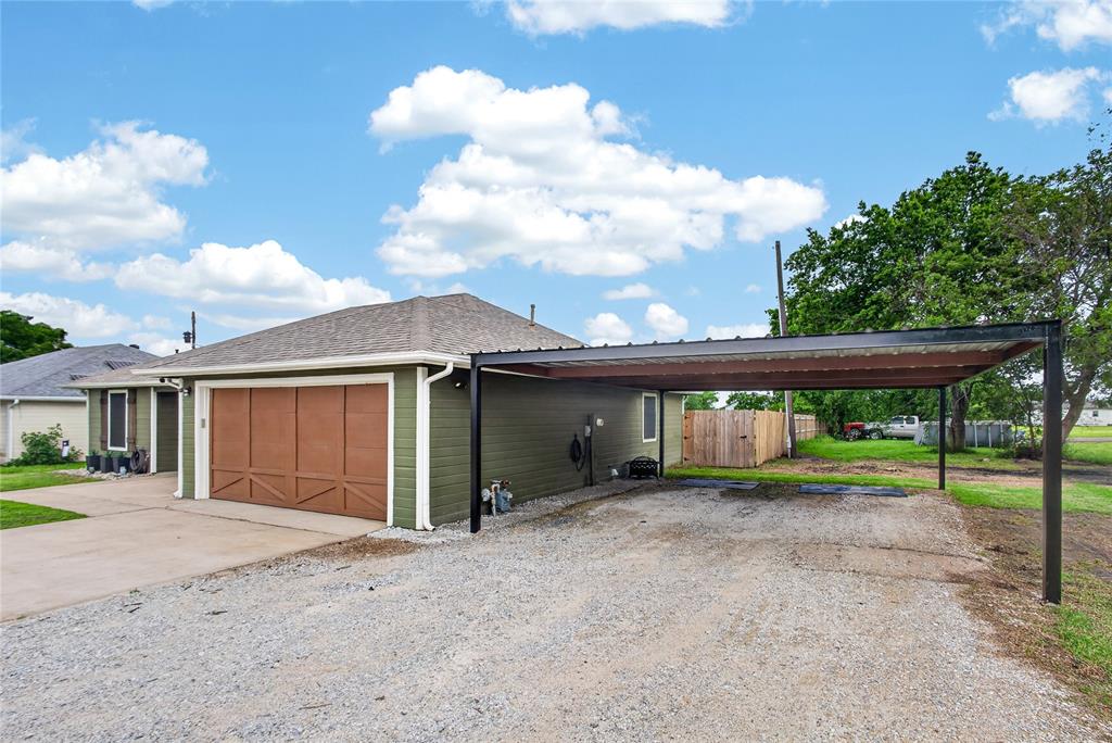 703 College Street Celeste, TX 75423 - Photo 4 of 29 a view of a house with a yard and barbeque oven