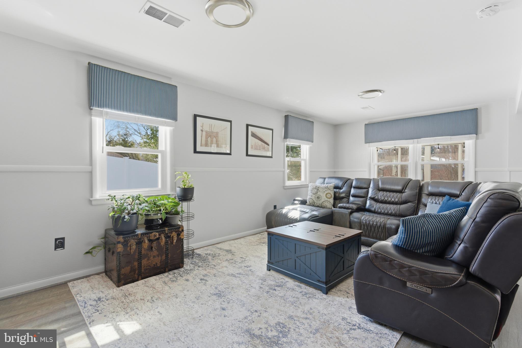 5020 Alta Vista Road Bethesda, MD 20814 - Photo 27 of 41 a living room with furniture potted plant and a window