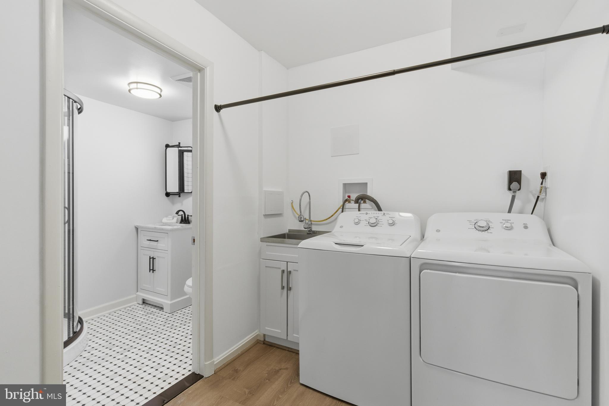 5020 Alta Vista Road Bethesda, MD 20814 - Photo 29 of 41 a utility room with dryer and washer