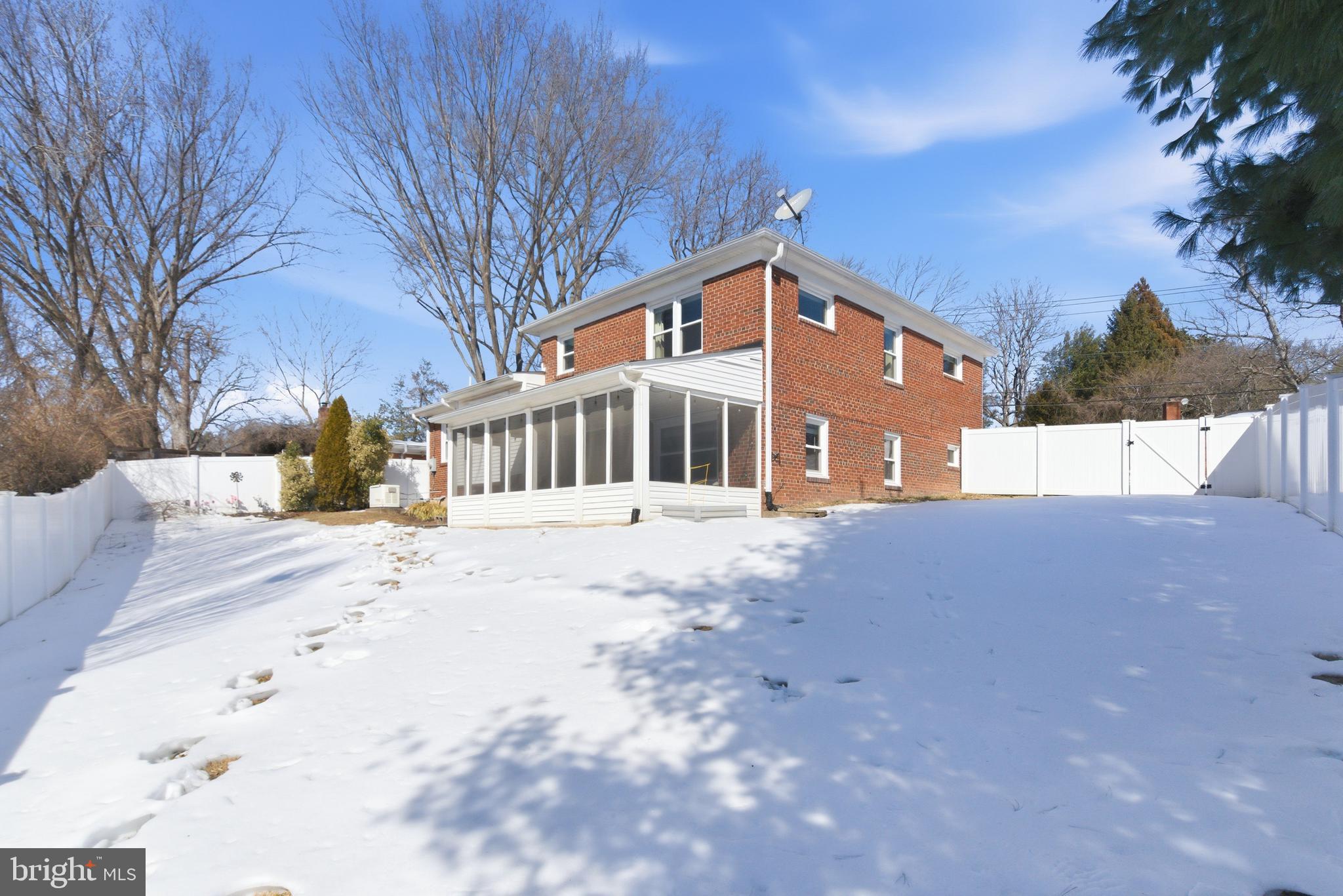 5020 Alta Vista Road Bethesda, MD 20814 - Photo 37 of 41 a front view of a house with a yard