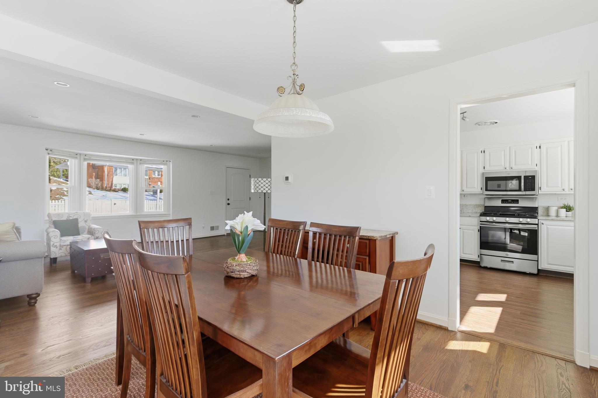 5020 Alta Vista Road Bethesda, MD 20814 - Photo 6 of 41 a view of a dining room with furniture