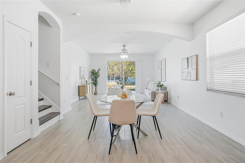 12351 Ridgedale Drive Hudson, FL 34669 - Photo 14 of 48 a view of a dining room with furniture window and wooden floor