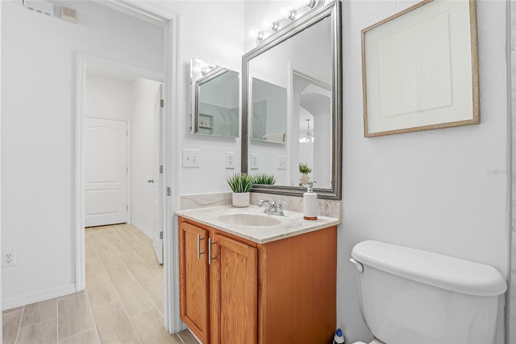 12351 Ridgedale Drive Hudson, FL 34669 - Photo 32 of 48 a bathroom with a sink a toilet and shower