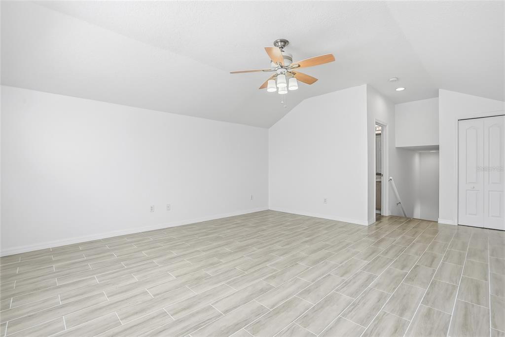 12351 Ridgedale Drive Hudson, FL 34669 - Photo 38 of 48 wooden floor in an empty room