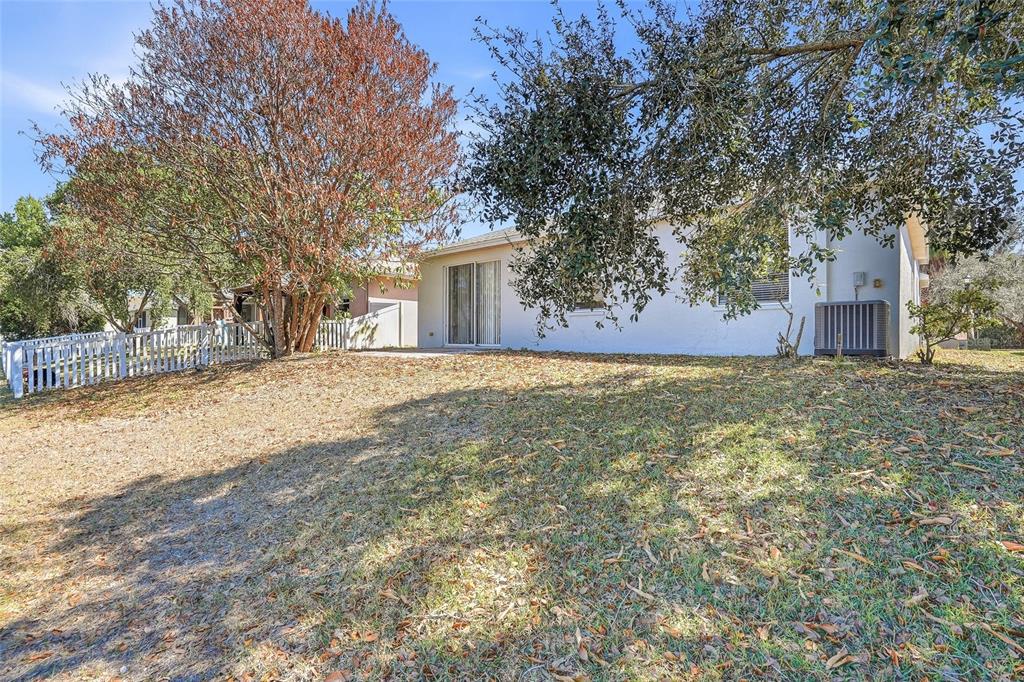 12351 Ridgedale Drive Hudson, FL 34669 - Photo 41 of 48 a view of a yard with large trees
