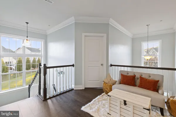 a white bath tub sitting next to a shower