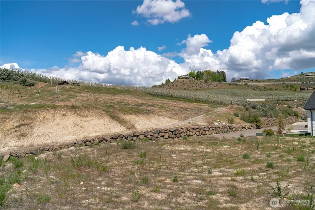 a view of a room with a lake and a mountain view