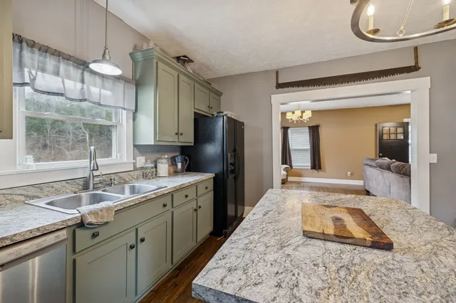 a workspace with furniture and wooden floor