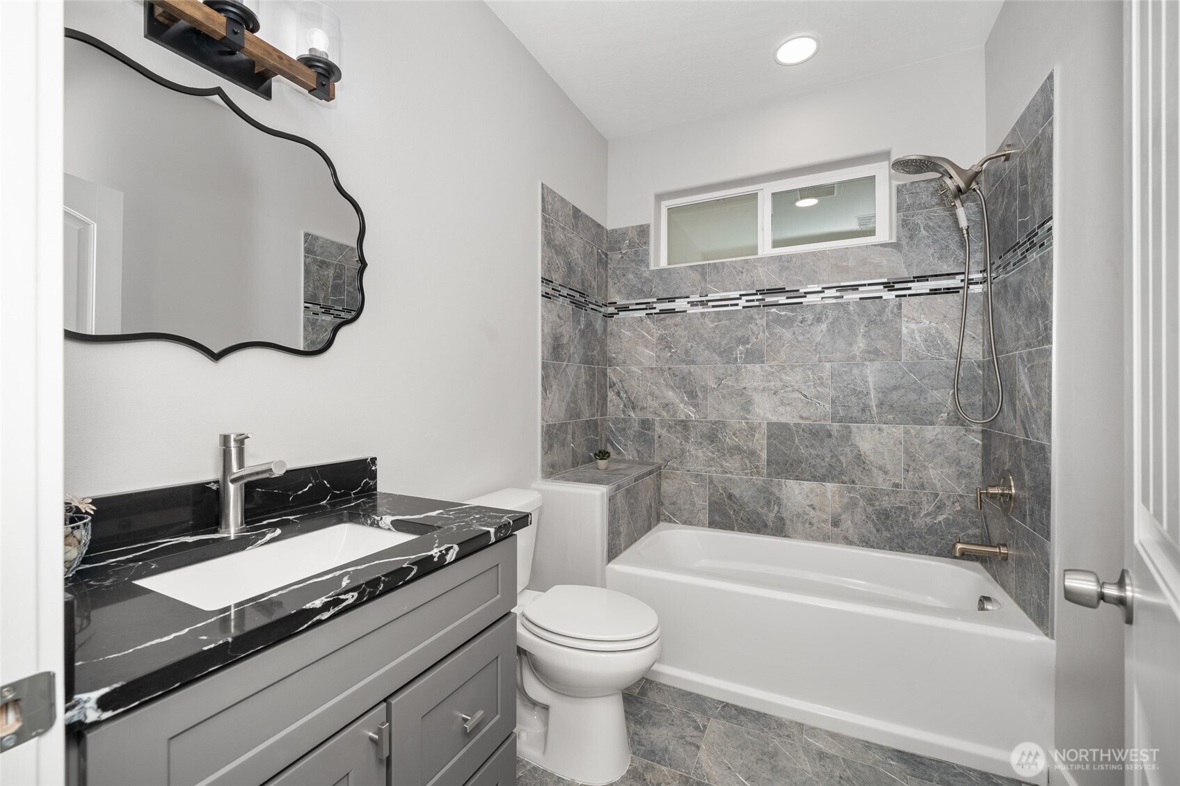 35315 South Bootstrap Lane Cheney, WA 99004 - Photo 11 of 27 a bathroom with a granite countertop sink a toilet and bathtub