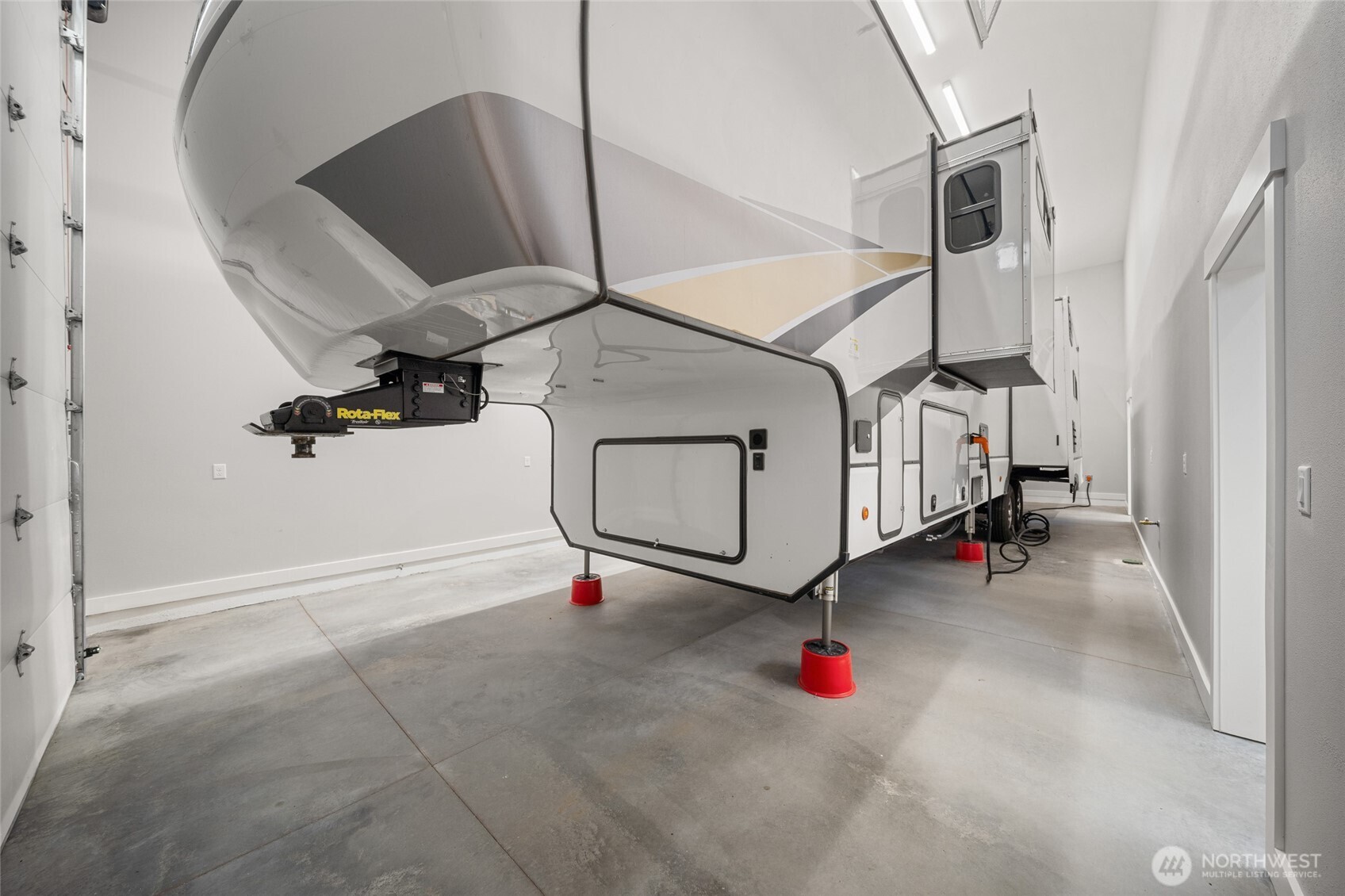 35315 South Bootstrap Lane Cheney, WA 99004 - Photo 14 of 27 a view of an empty room with wooden floor and windows