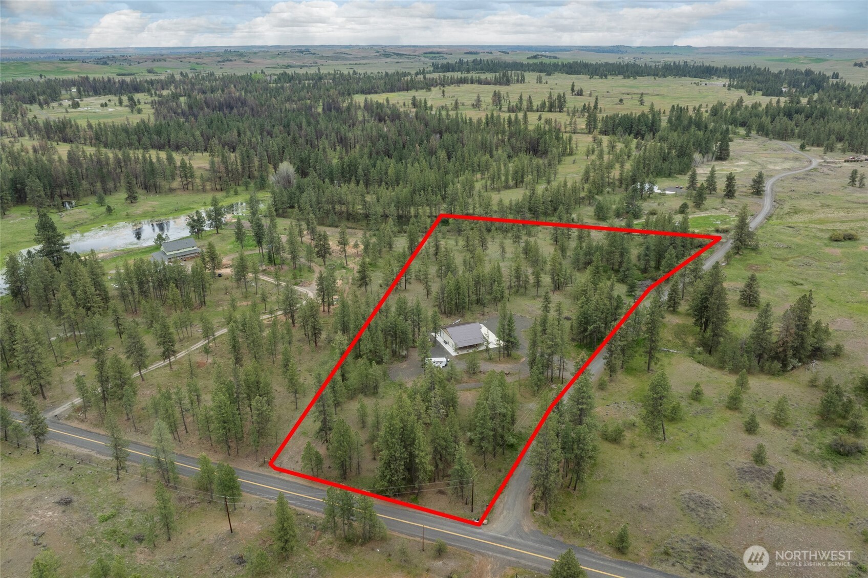 35315 South Bootstrap Lane Cheney, WA 99004 - Photo 27 of 27 a view of a lake from a balcony
