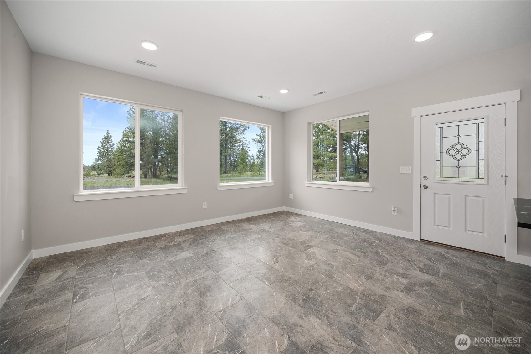 35315 South Bootstrap Lane Cheney, WA 99004 - Photo 4 of 27 a view of an empty room with windows