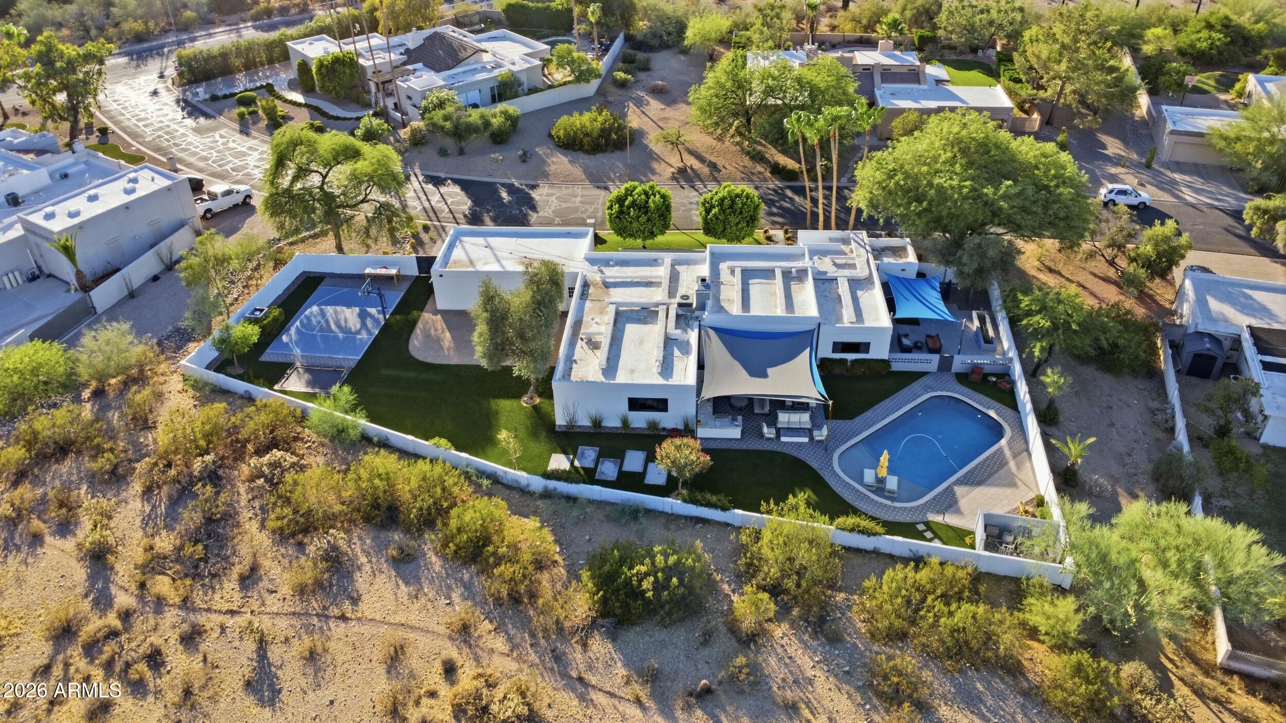 4417 East Mountain View Road Phoenix, AZ 85028 - Photo 39 of 41 an aerial view of residential houses with outdoor space