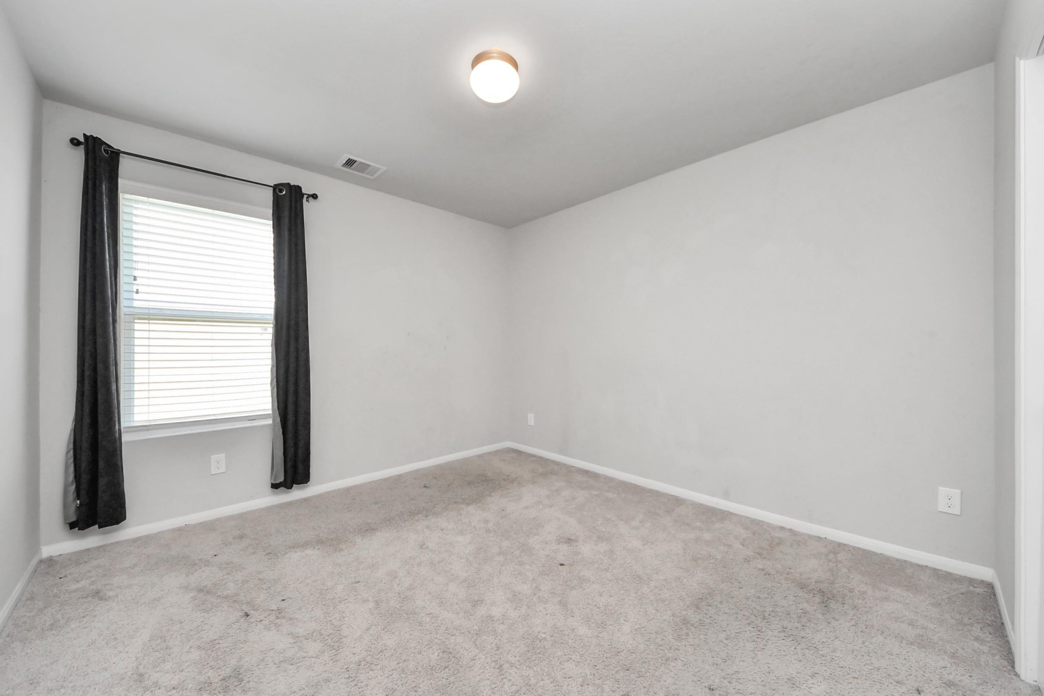 2643 Ridgeback Drive Rosenberg, TX 77471 - Photo 36 of 46 an empty room with a empty space and windows
