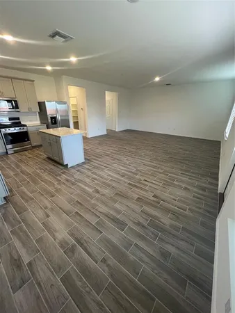 a view of a livingroom with furniture