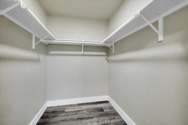 a view of a room with racks on the wall