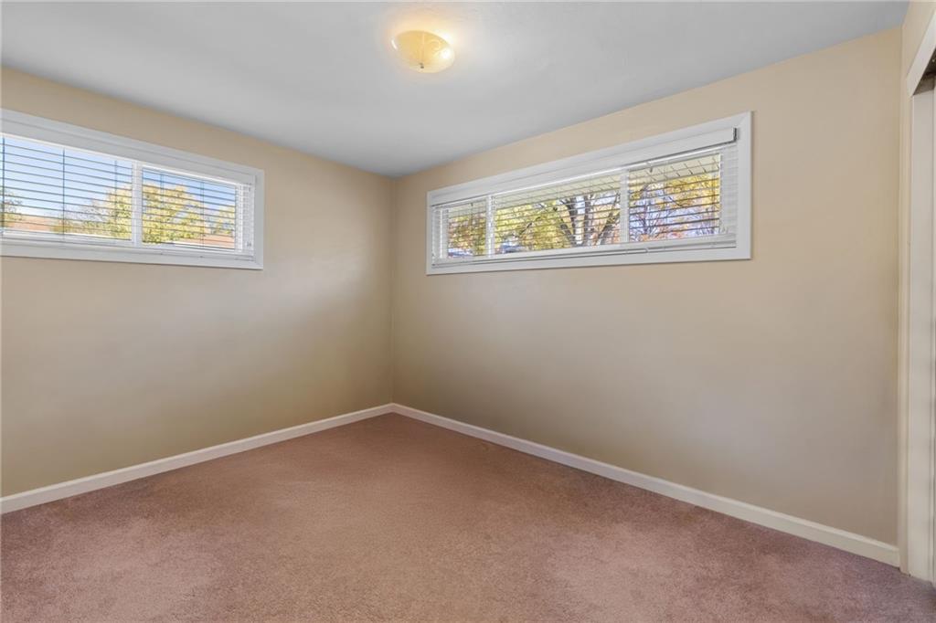 587 Firethorne Drive Monroeville, PA 15146 - Photo 21 of 29 a view of an empty room with a window