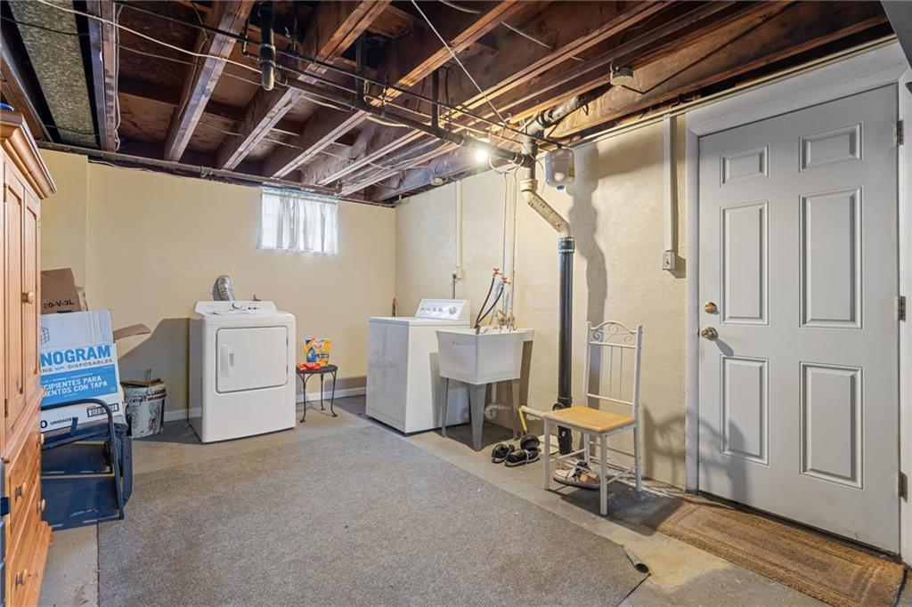 587 Firethorne Drive Monroeville, PA 15146 - Photo 27 of 29 a utility room with dryer and washer