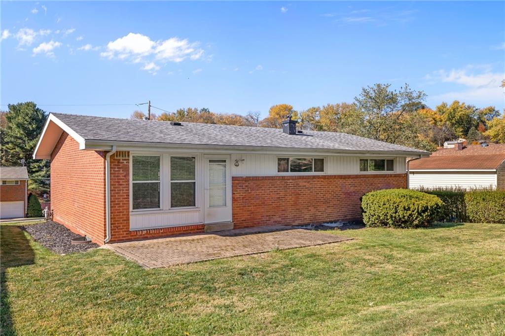 587 Firethorne Drive Monroeville, PA 15146 - Photo 29 of 29 a front view of a house with a garden