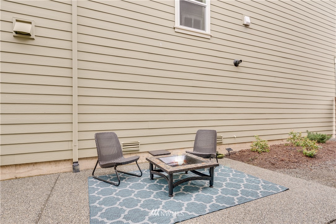 4408 186th Street Southeast Bothell, WA 98012 - Photo 11 of 23 a bench sitting in middle of a house