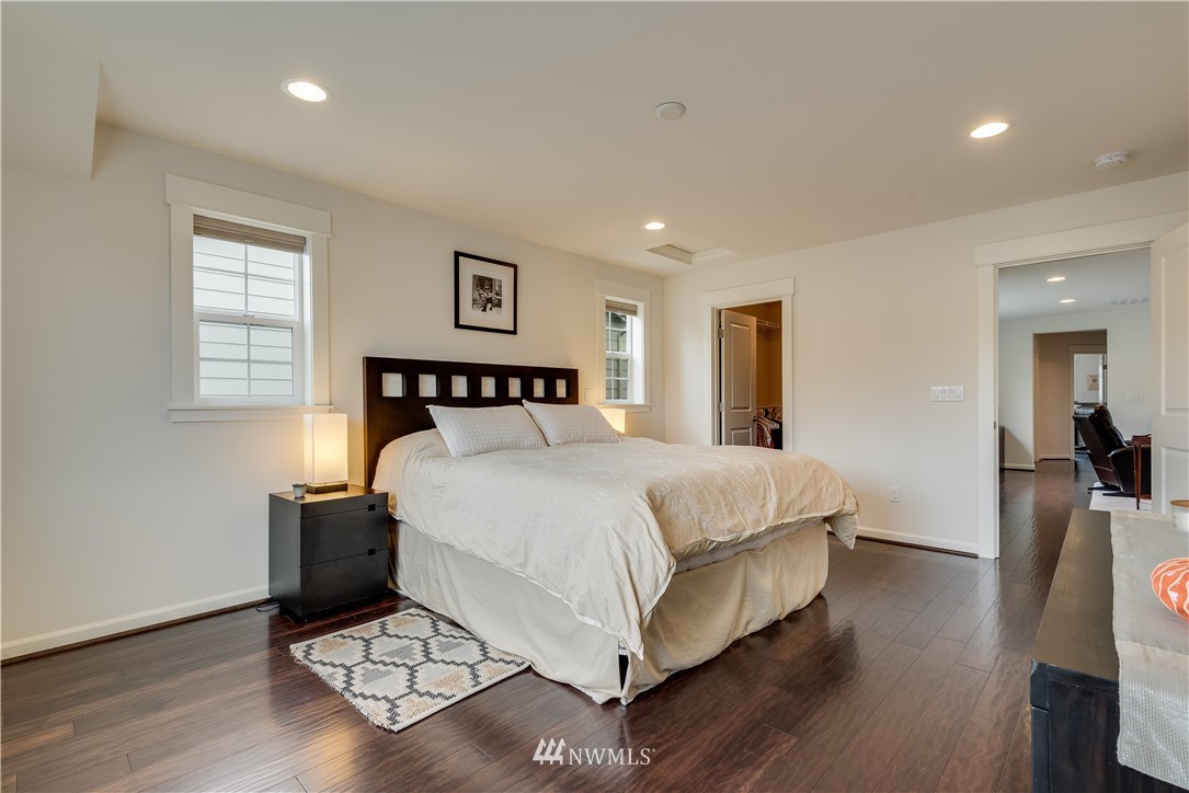 4408 186th Street Southeast Bothell, WA 98012 - Photo 14 of 23 a bedroom with a bed and wooden floor