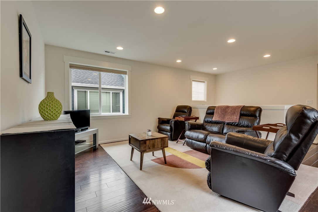 4408 186th Street Southeast Bothell, WA 98012 - Photo 20 of 23 a living room with furniture and a window
